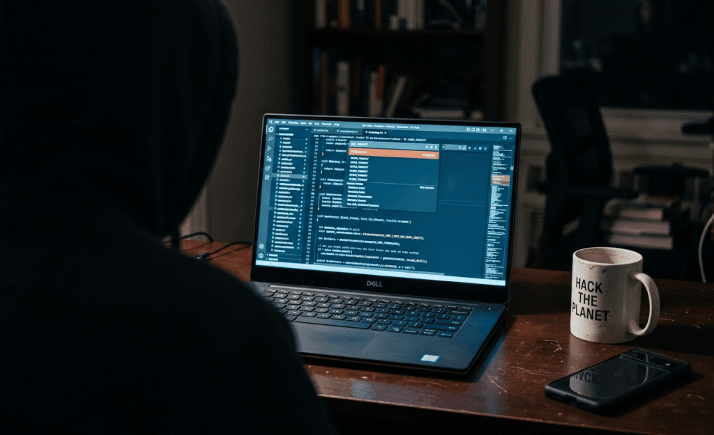 A laptop screen showing a search dialog with zero results in a dark room, capturing the moment of discovering a missing Isabelle HOL lemma during formal verification